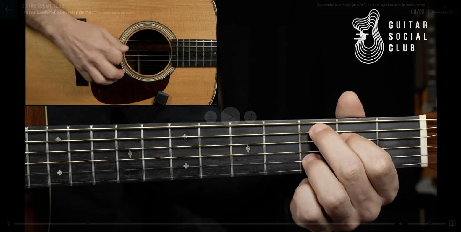 Séance de jeu dans l'app Guitar Social Club : jouer en rythme avec le support vidéo
